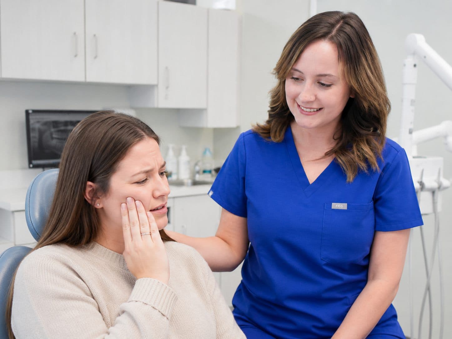 A patient being seen for urgent tooth pain